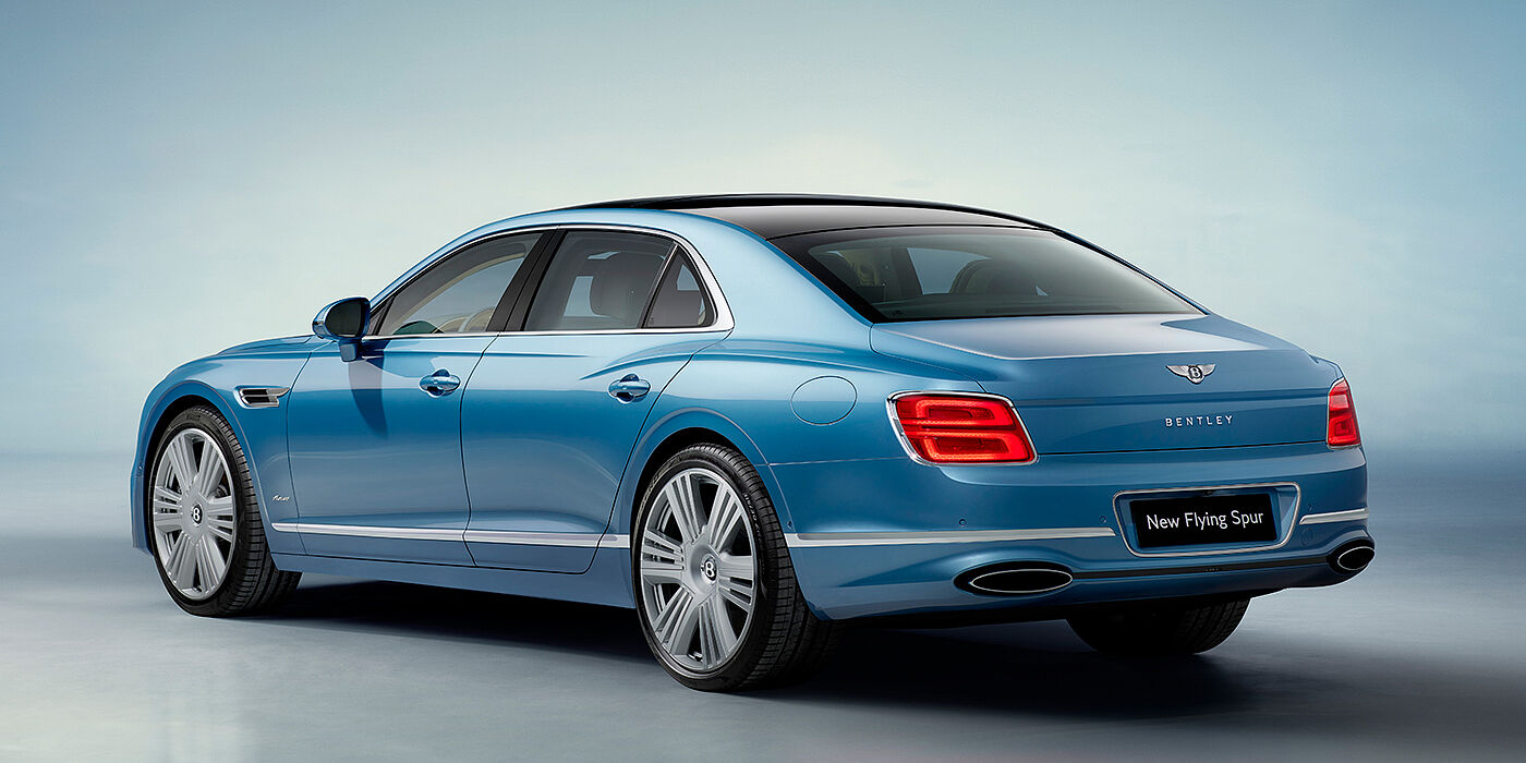 Bentley Marbella New Bentley Flying Spur Azure sedan rear view in Light windsor blue by Mulliner paint with 22 inch Azure wheels and chrome exterior details