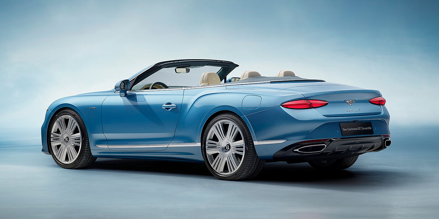 Bentley Marbella New Bentley Continental GTC Azure convertible rear view in Light Windsor blue paint with 22 inch ten spoke wheels and chrome exterior details