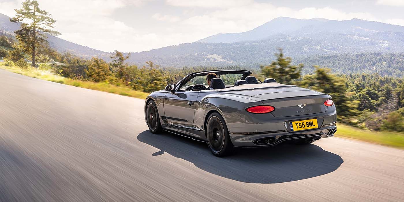 Bentley Marbella Bentley Continental GTC S convertible in Cambrian Grey paint rear 34 dynamic driving