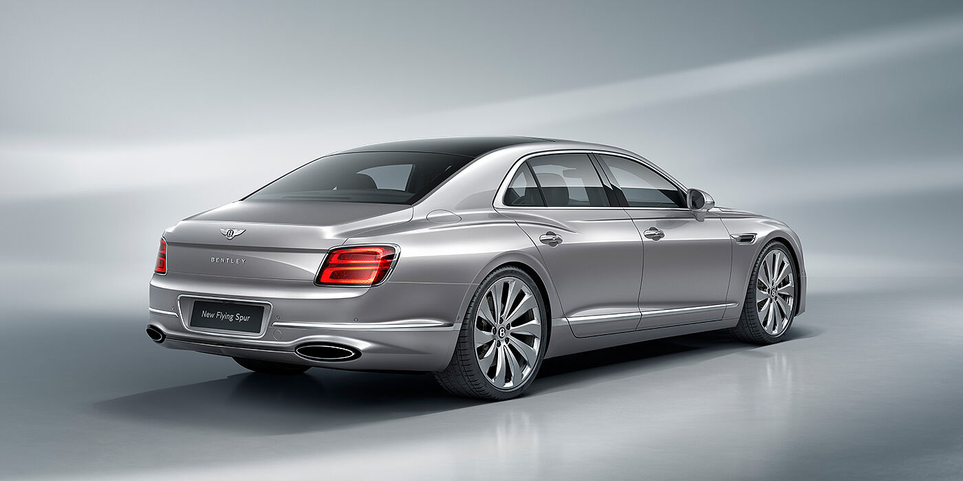 Bentley Marbella New Bentley Flying Spur sedan rear view in Silverlake paint with ten spoke wheels and chrome matrix grille