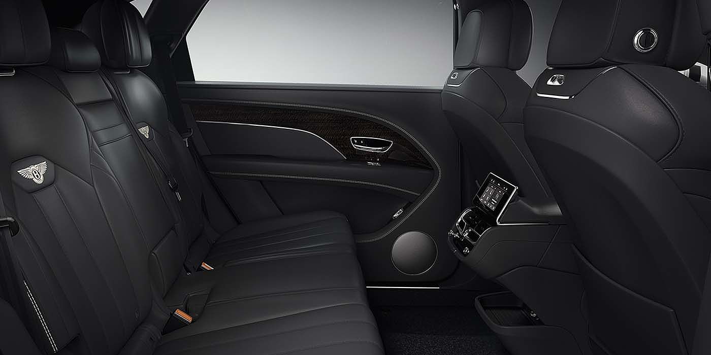 Bentley Marbella Bentley Bentayga EWB SUV rear interior in Beluga black leather