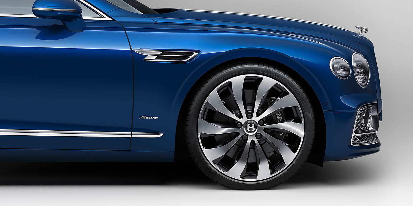 Bentley Marbella Bentley Flying Spur Azure sedan side close up in Sequin Blue paint with Azure badge