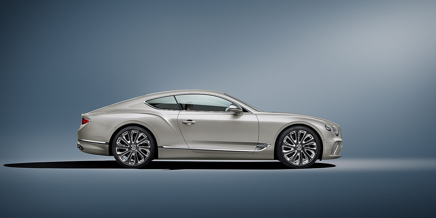 Bentley Marbella Bentley Continental GT Mulliner coupe in White Sand paint front 34