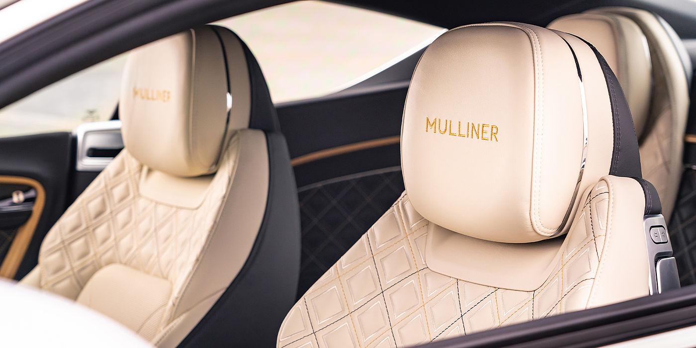 Bentley Marbella Bentley Continental GT Mulliner coupe seat detail in Beluga black and Linen hide