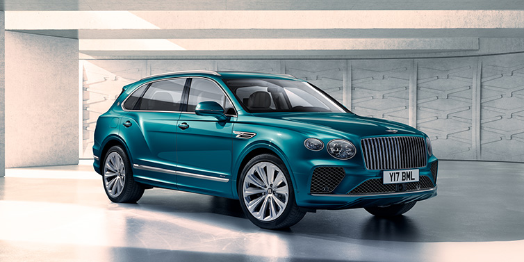 Bentley Marbella Bentley Bentayga Extended Wheelbase Azure SUV front three quarter in Topaz blue paint colour with a grey background