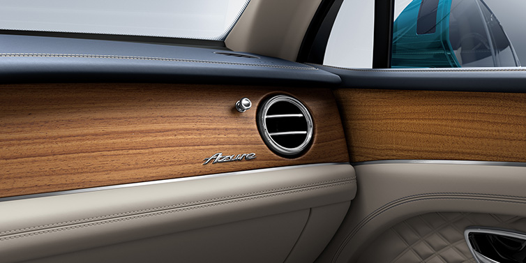 Bentley Marbella Bentley Bentayga Extended Wheelbase Azure front dash showing Open Pore Koa veneer surrounded by Portland and Imperial Blue hides